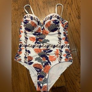 One piece swimsuit. Excellent unused condition. Size L